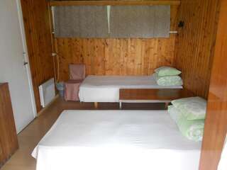 Комплексы для отдыха с коттеджами/бунгало Laulasmaa Holiday Center Лауласмаа Двухместный номер с 2 отдельными кроватями и общей ванной комнатой-7